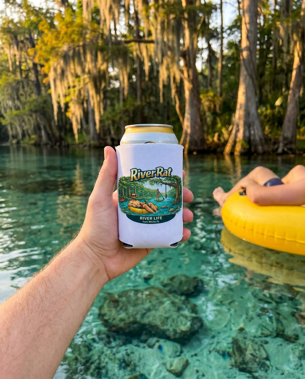 River Life Beer Can Cozy lifestyle on tube floating in spring water