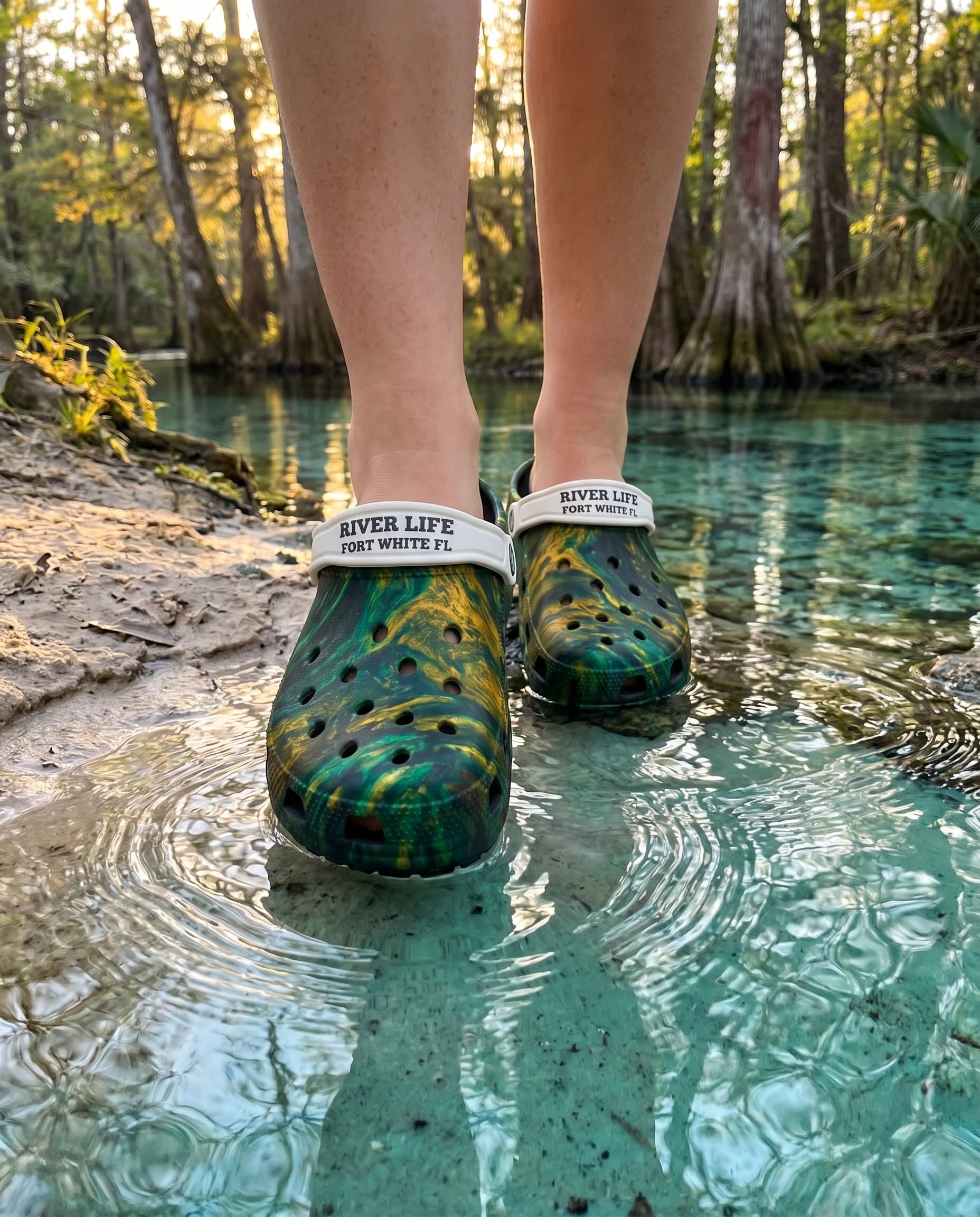 Golden Springs EVA Clogs lifestyle stepping into teal spring water