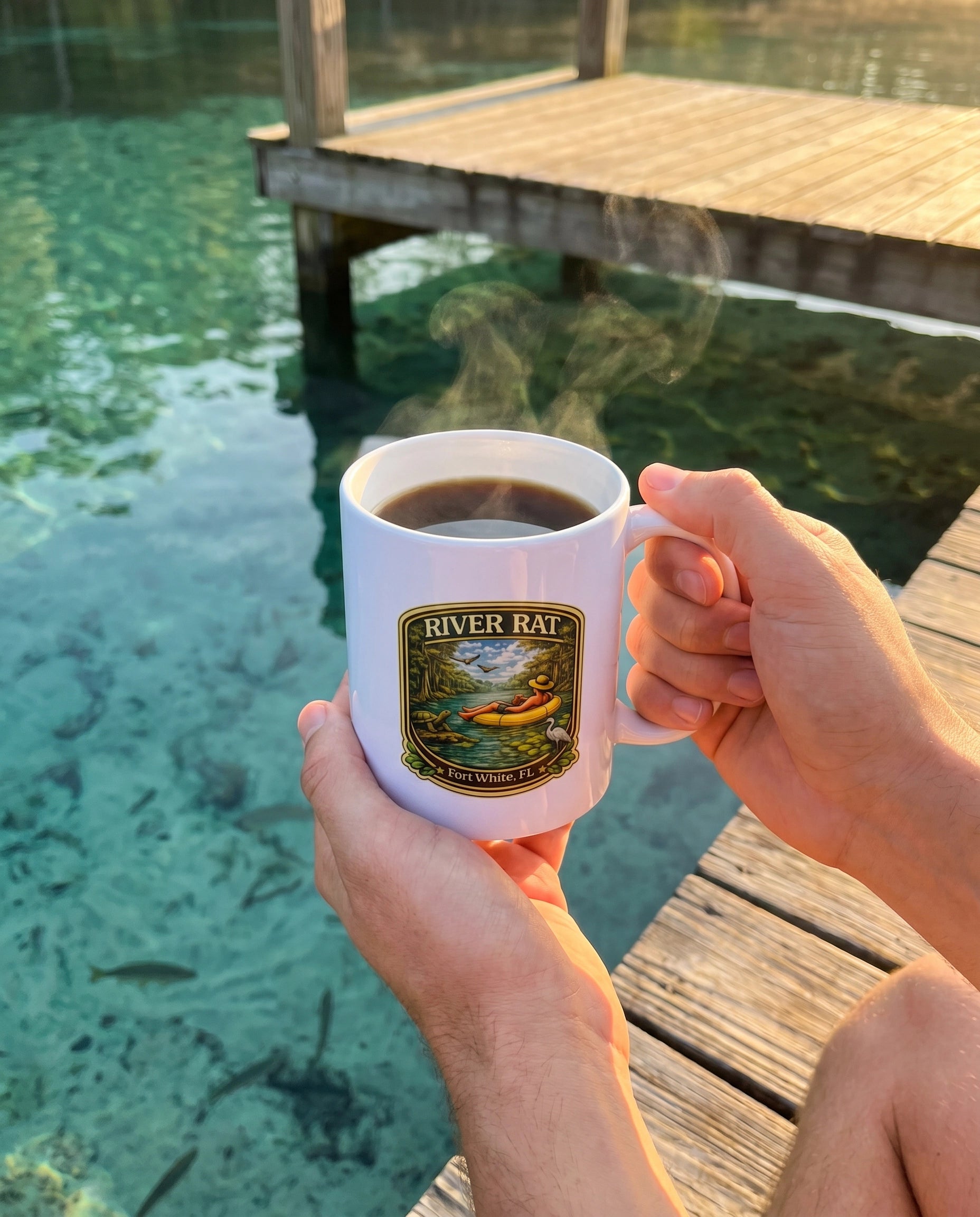 River Rat Ceramic Mug lifestyle on dock at sunrise with spring water