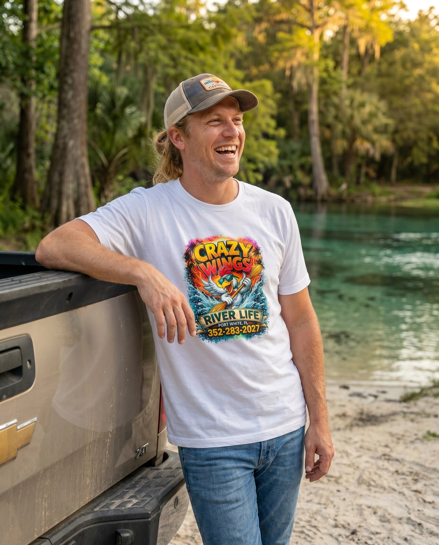 The Owen Mens T-Shirt Crazy Wings lifestyle at truck tailgate by spring